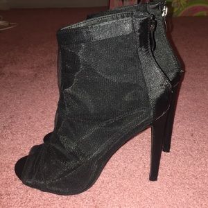 Fashion Nova size 7.5 black mesh heeled booties.